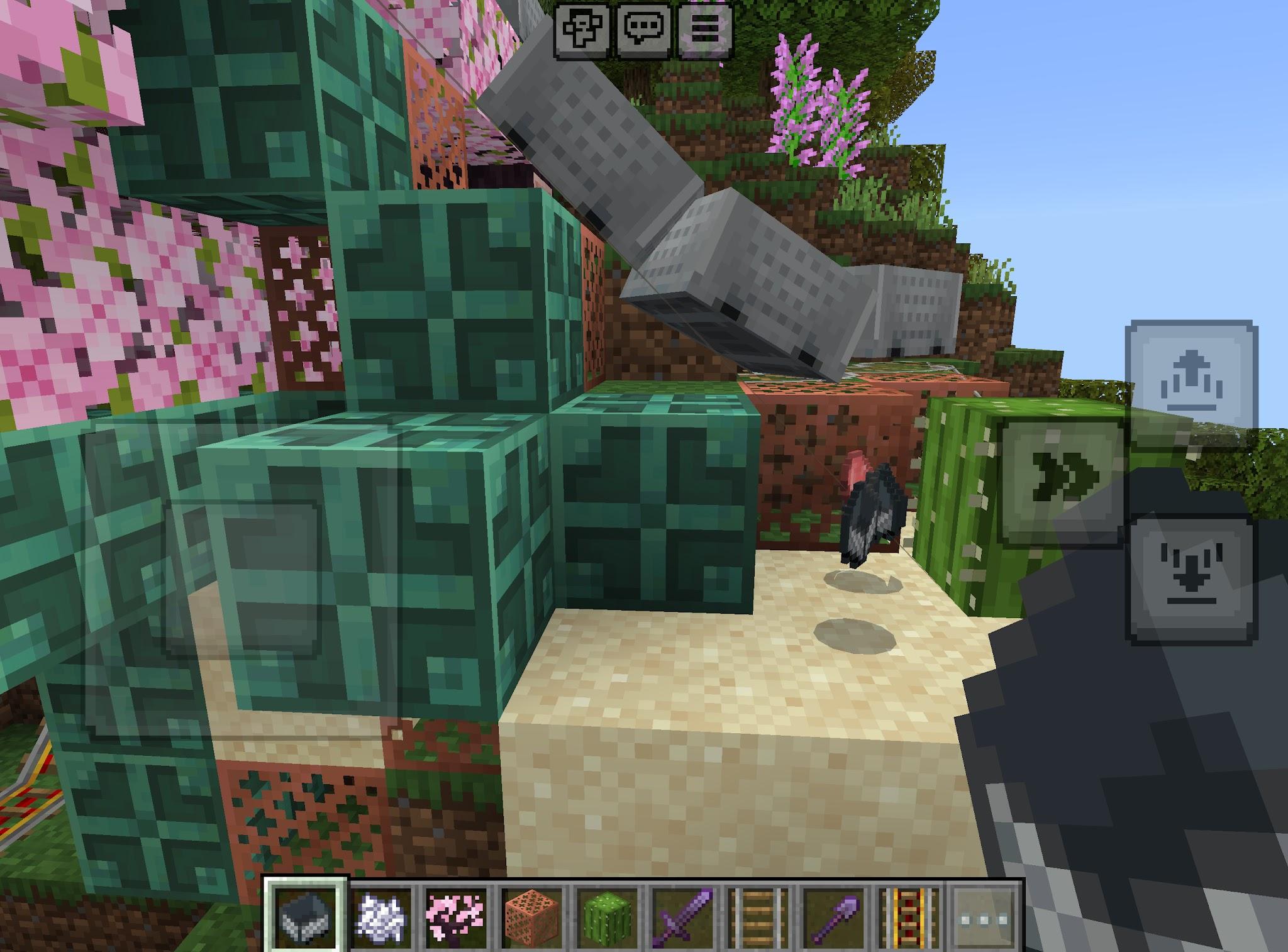 Minecraft minecarts and rails near the cherry tree biome