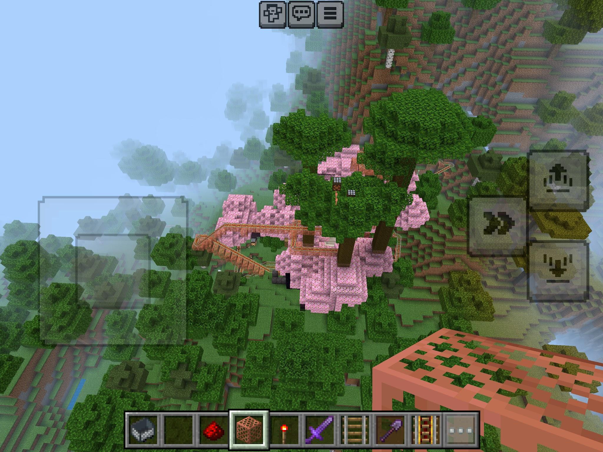 Roger's Minecraft world with cherry trees and a rollercoaster